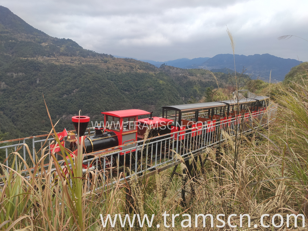 sightseeing train on hill bridge